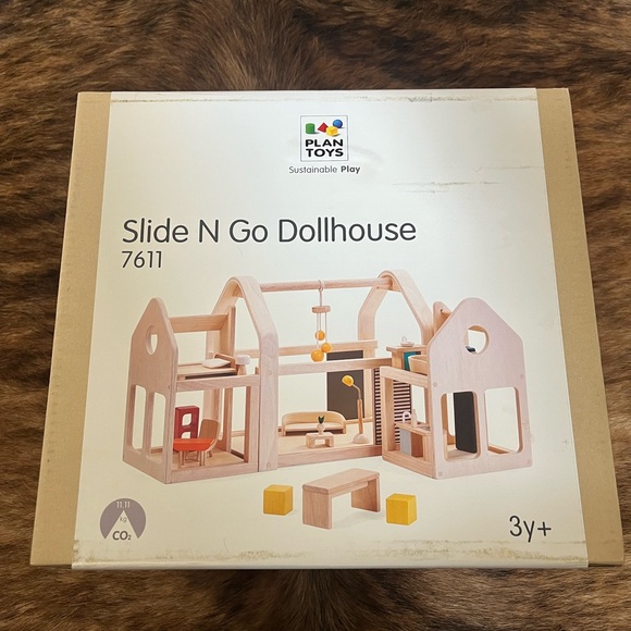 Plan Toys Other - Wooden Dollhouse - Natural and Colorful